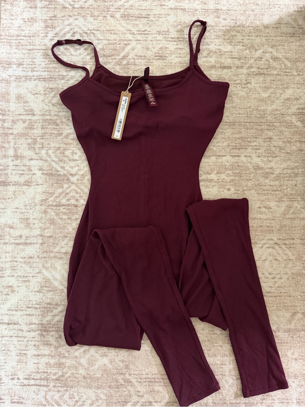 SKIMS Ribbed Spaghetti-Strap Jumpsuit in Deep Wine